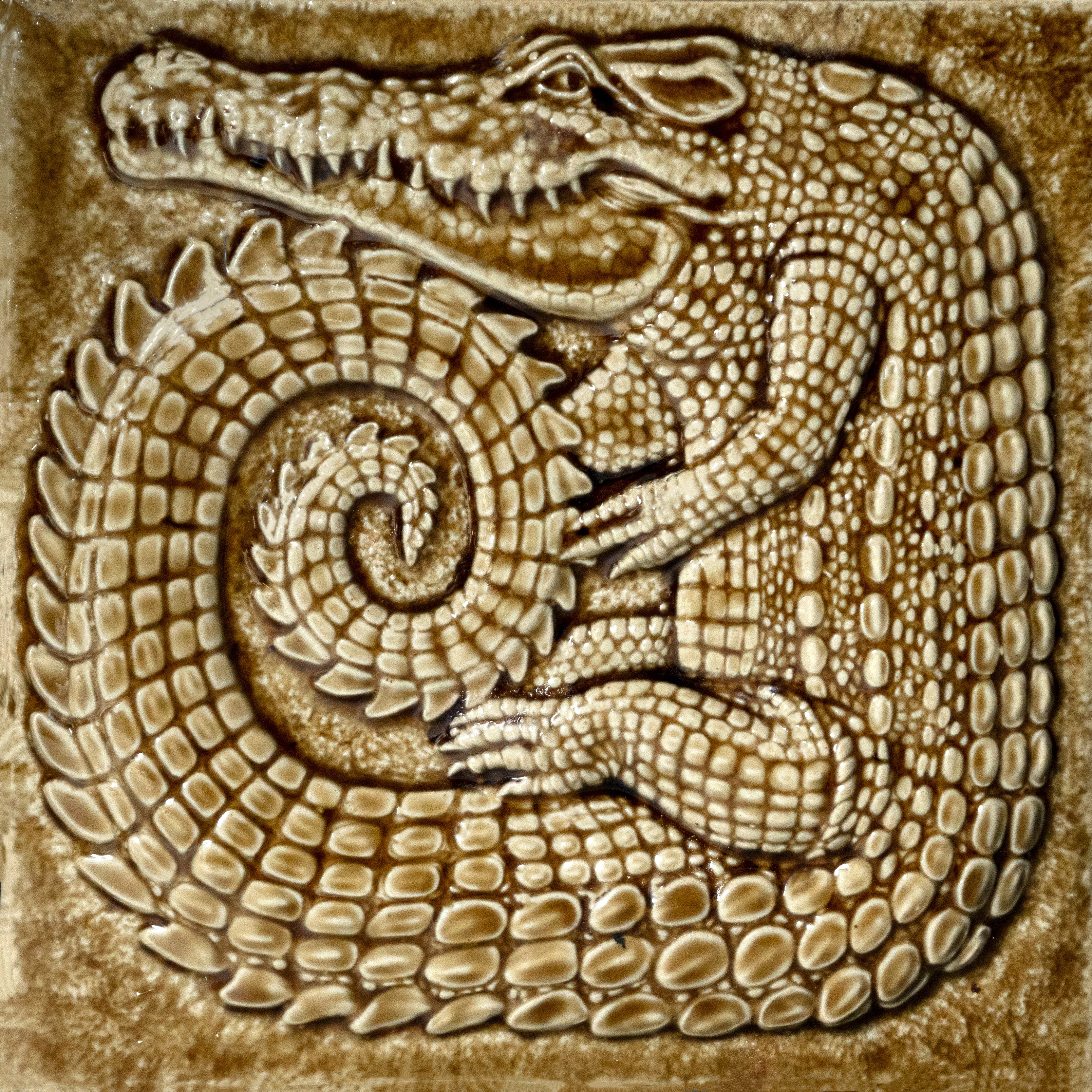 Crocodile tile in amber, straight on
