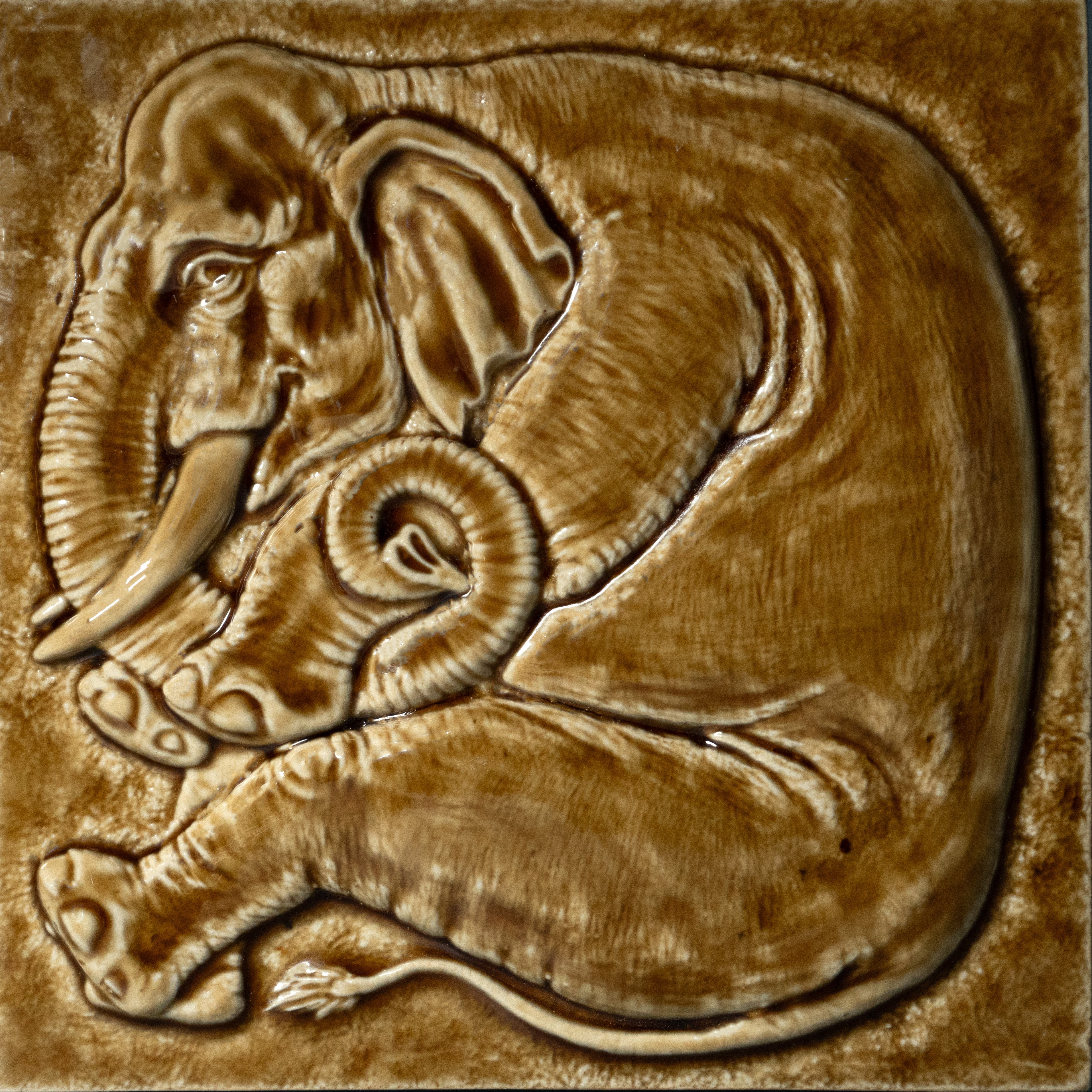 Amber elephant bas-relief tile